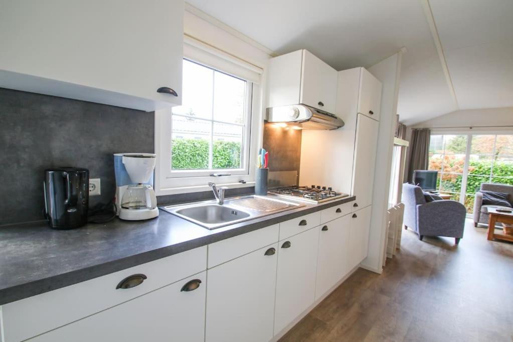 אפ Luxe Vrijstaande Chalet מראה חיצוני תמונה